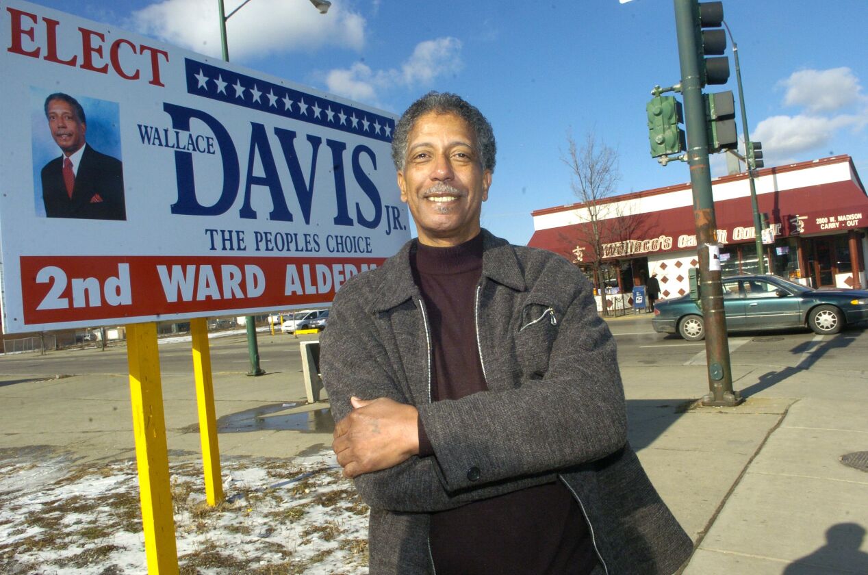 Former Ald. Wallace Davis Jr. (26th) posing across the street from his restaurant, Wallace’s Catfish Corner, during a 2007 comeback attempt in the 2nd Ward.